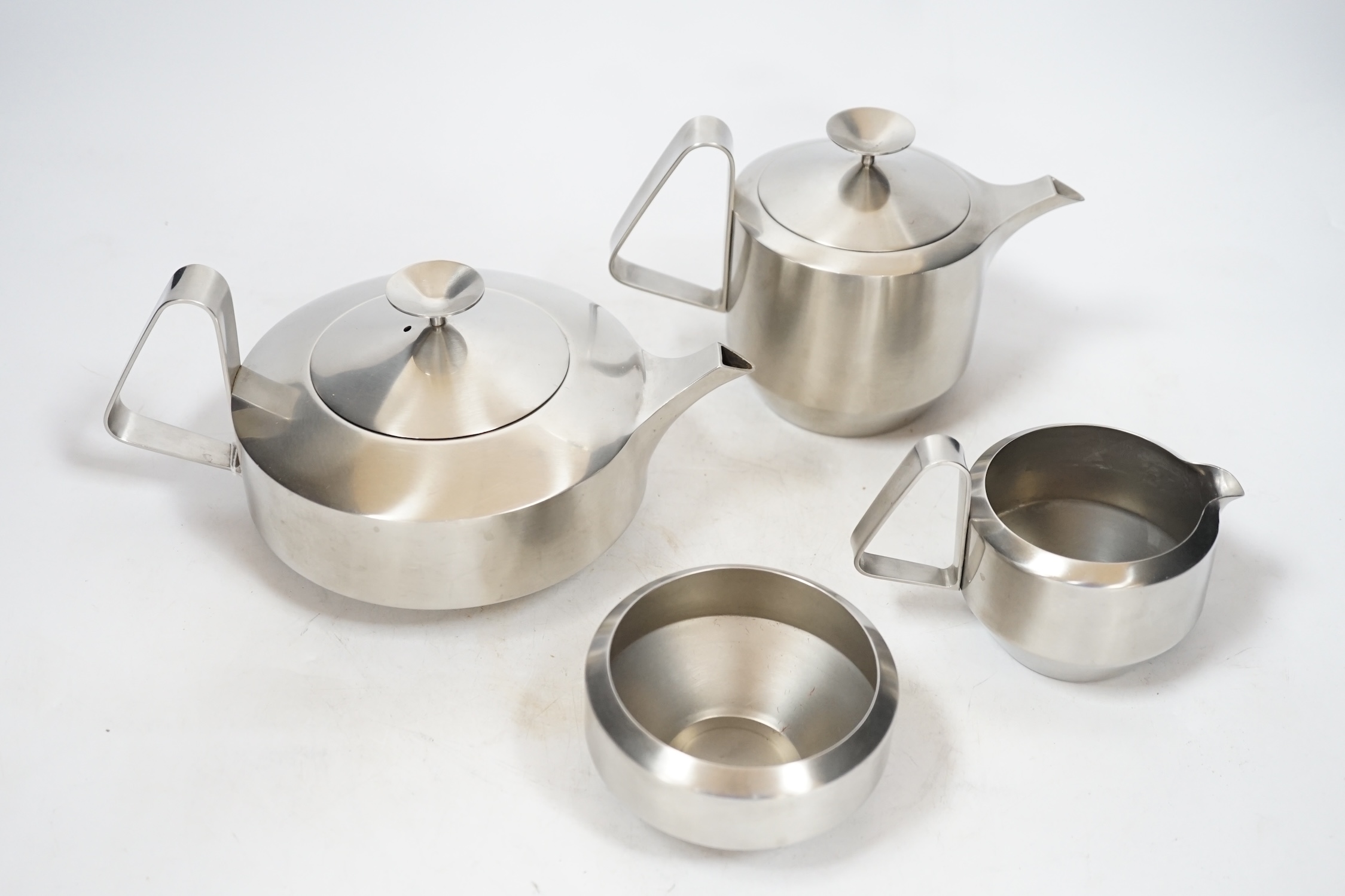 An Old Hall stainless steel four piece tea set, comprising of teapot, 11cm high, water pot, milk jug and sugar bowl